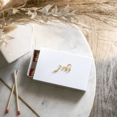White Lucite Matches Box with Gold Logo Text Design